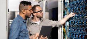 computer support specialists analyzing network pro CE9S4ZF