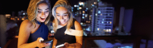 Two people looking at tablet